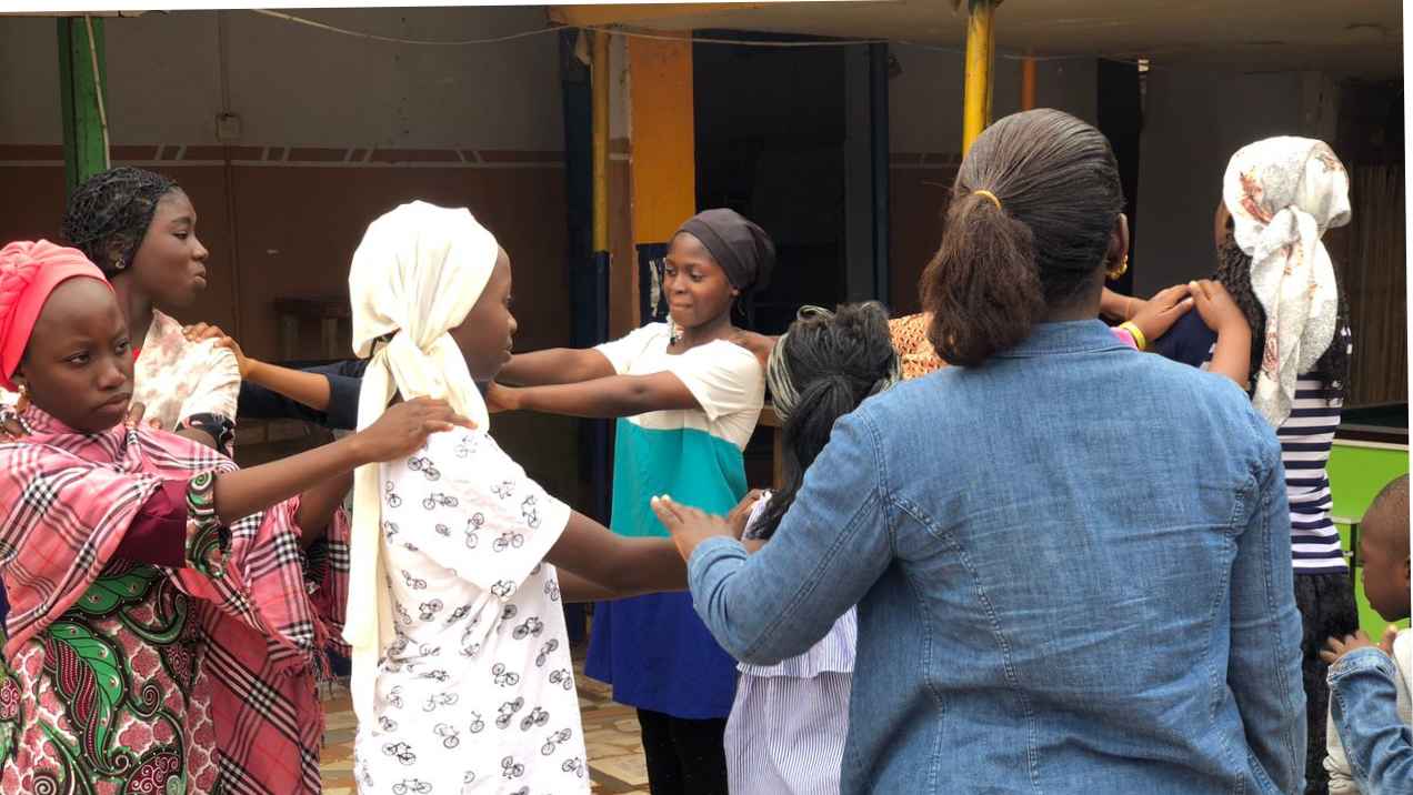 Jefiter leading the girls during an ice breaker session. Ice breakers get us motivated, alert and pepped up after a long session.
