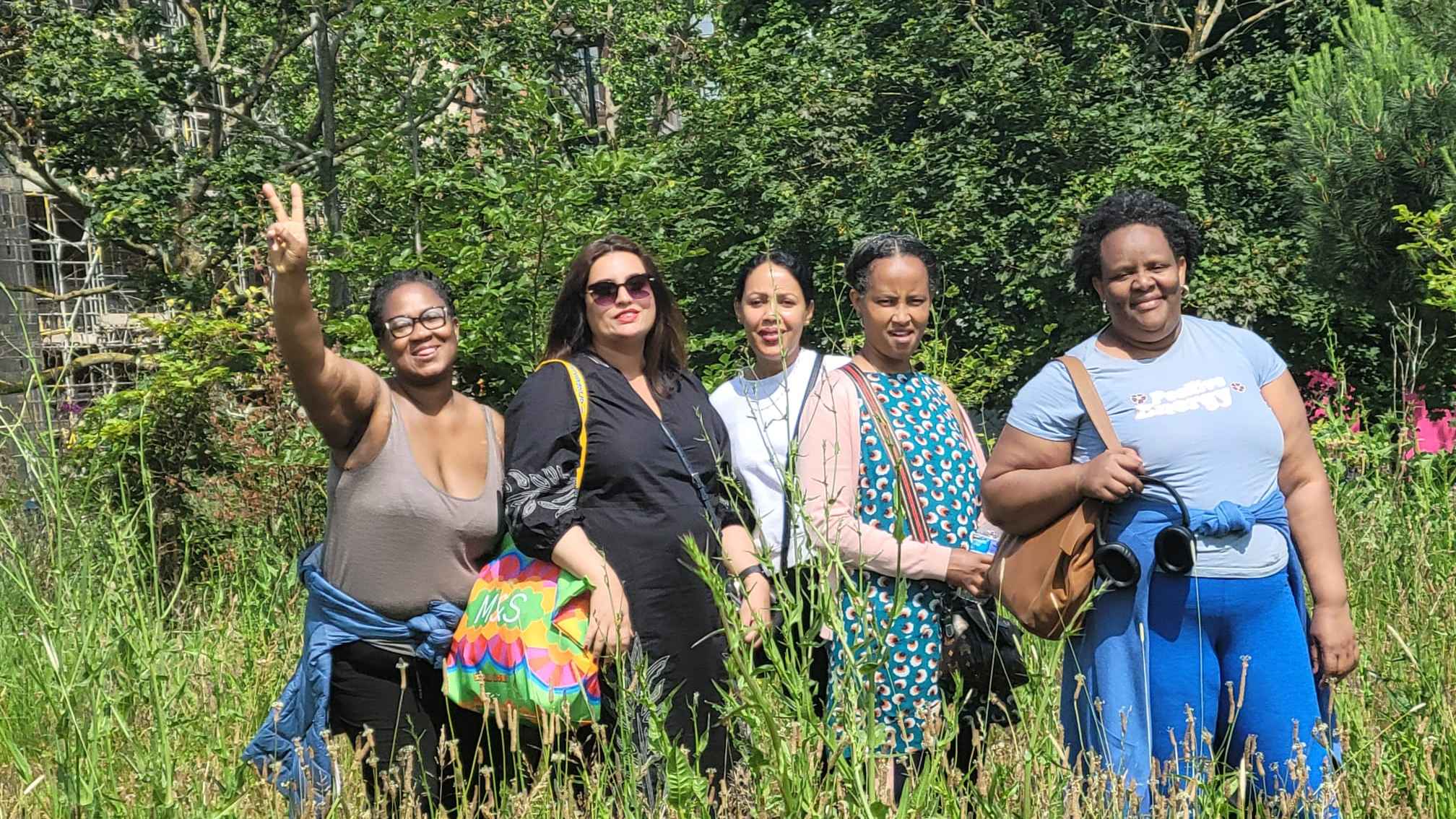 Parents/carers of neurodivergent children walking at burgess park in Southwark