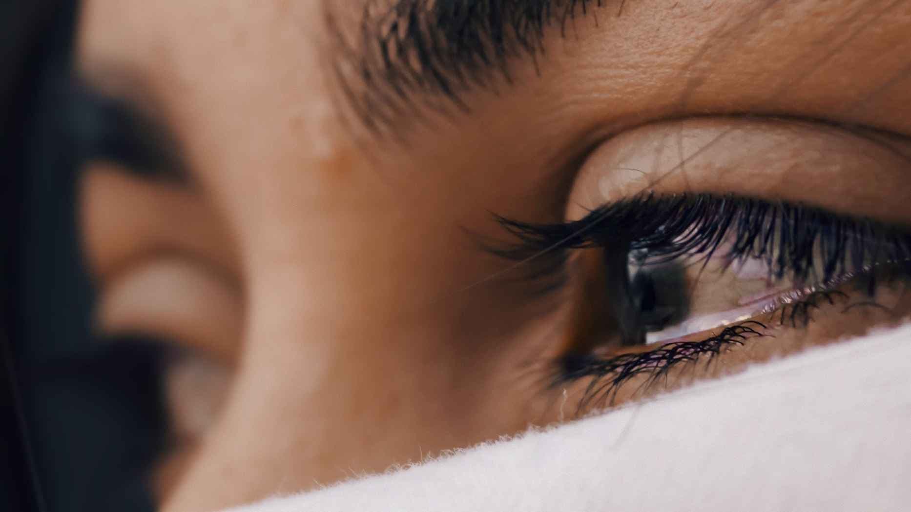 Tear-filled eyes.